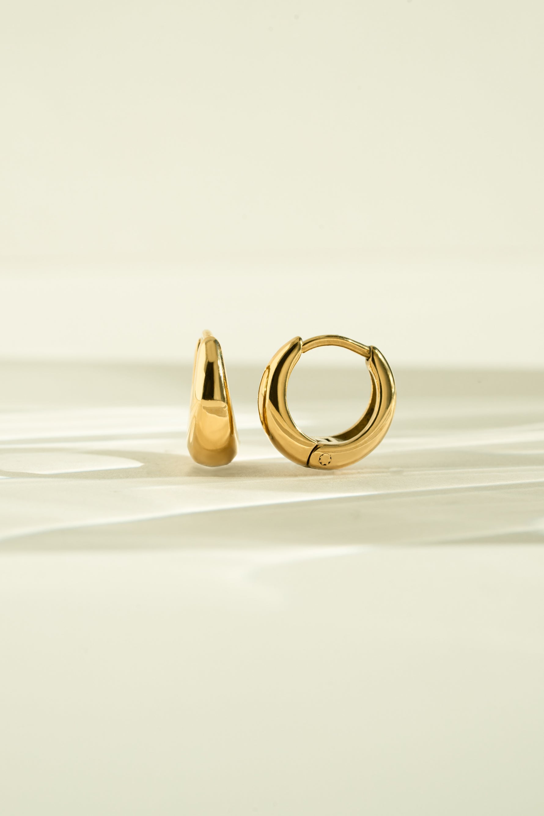Gold stainless steel SS Small Hoops earrings by Sami Jewels, showcasing sleek, waterproof hoop earrings for everyday wear.