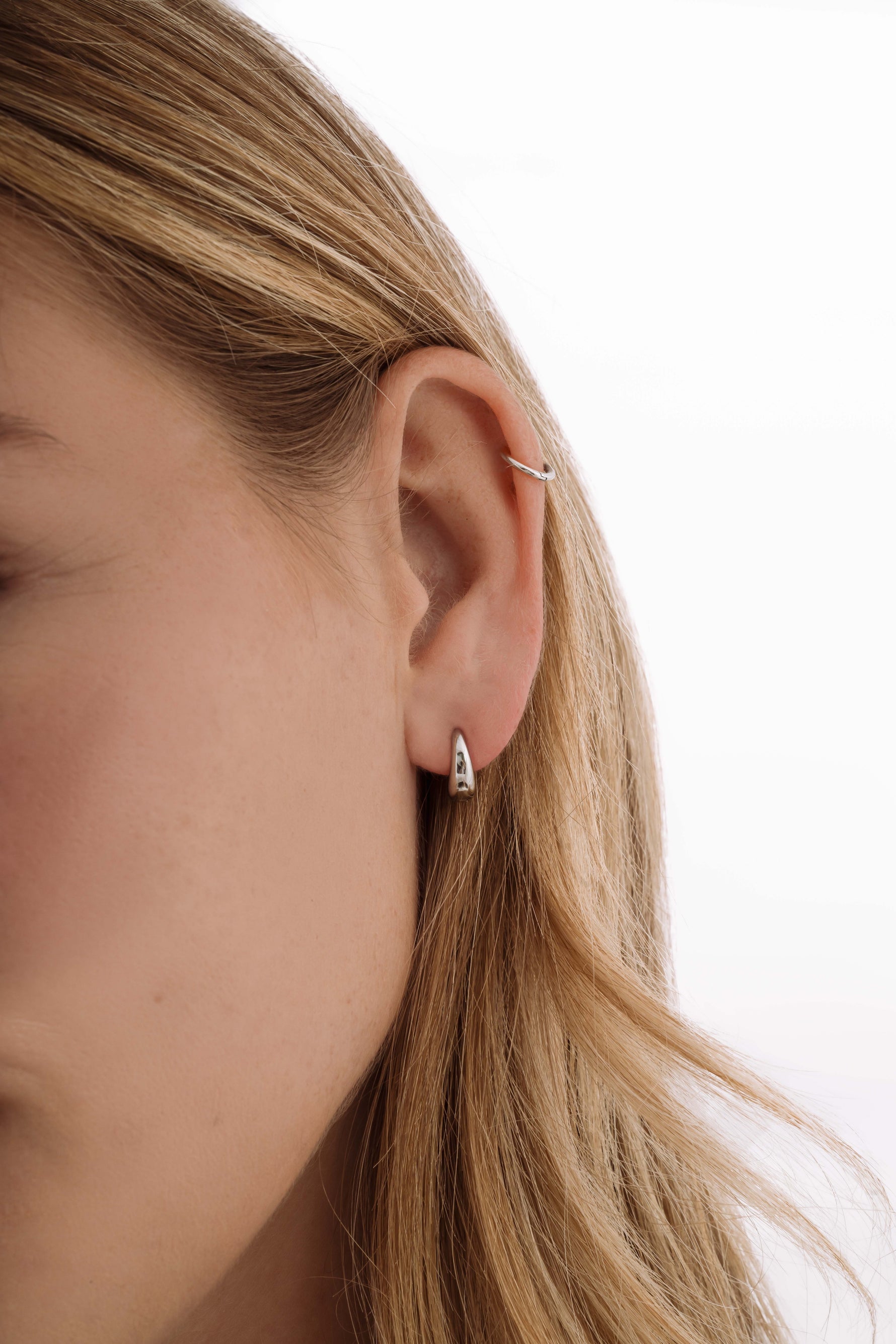 Silver stainless steel SS Small Hoops earrings by Sami Jewels, showcasing a close-up of waterproof, minimalist hoop earrings.