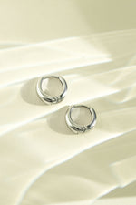 Silver stainless steel SS small hoop earrings by Sami Jewels, showcasing a sleek, waterproof design with a polished finish.