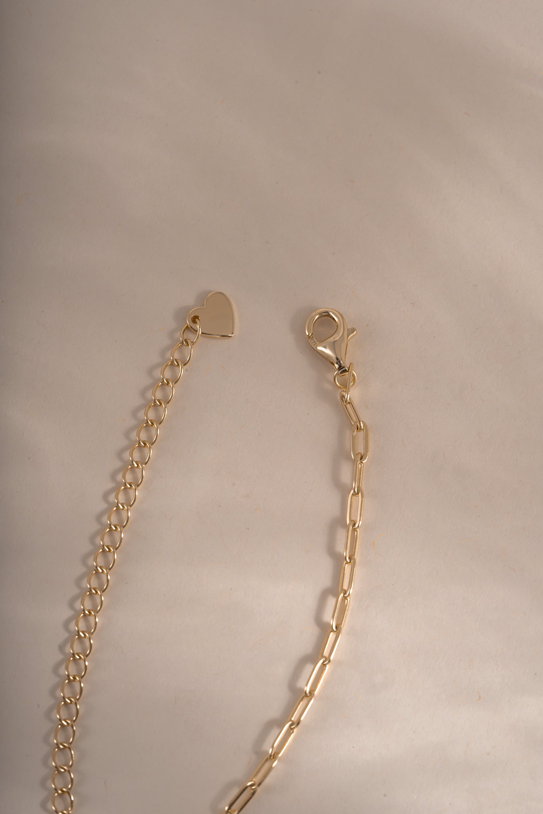 Gold Tiny Link Paperclip Necklace by Sami Jewels featuring a small paperclip chain with lobster clasp closure.