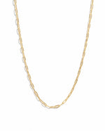 Gold Tiny Link Paperclip Necklace from Sami Jewels with delicate chain design on white background.