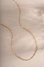 Gold Tiny Link Paperclip Necklace by Sami Jewels featuring a delicate paperclip chain design.