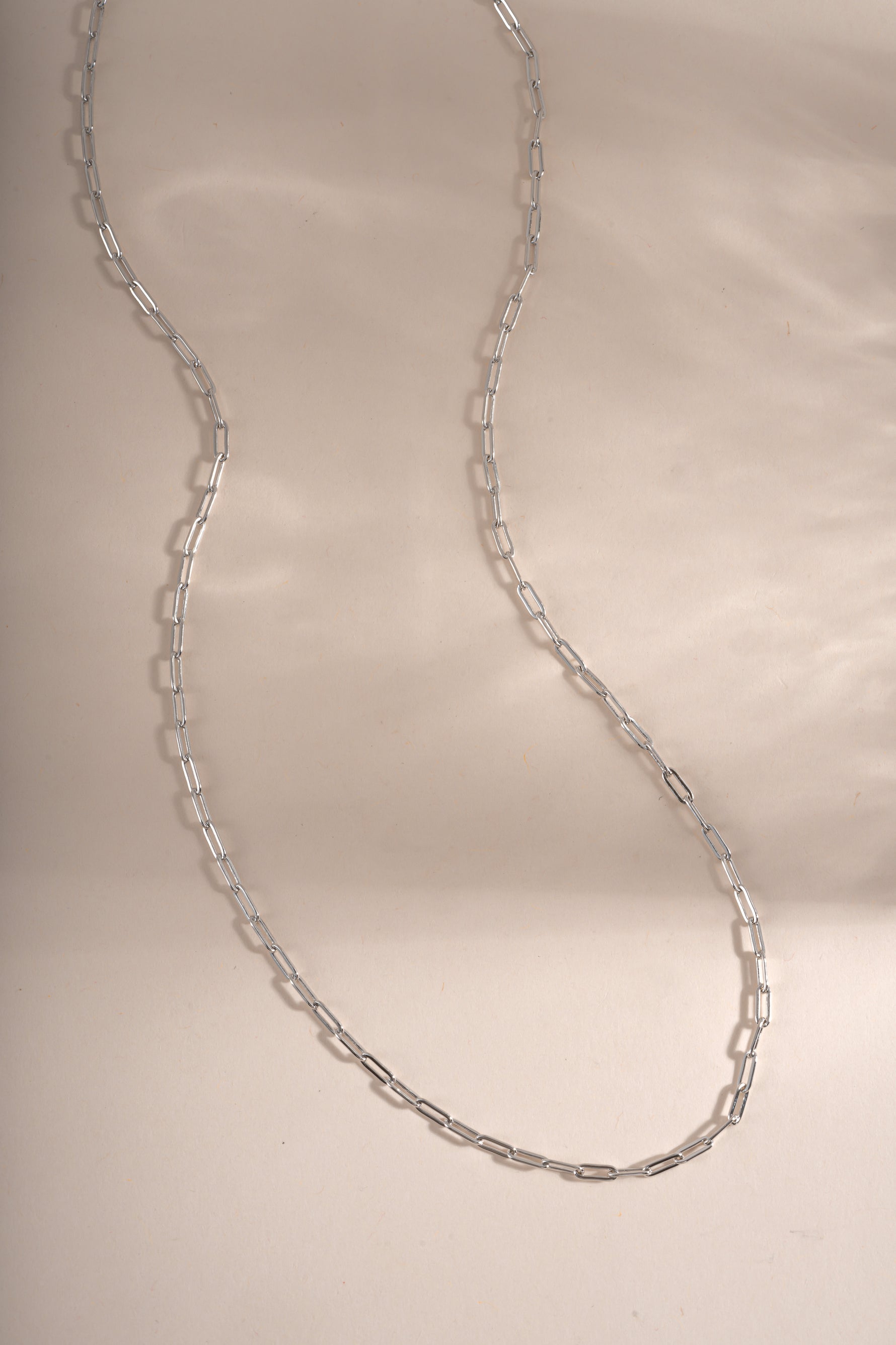 Sterling silver Tiny Link Paperclip Necklace by Sami Jewels featuring a delicate chain and modern paperclip design.