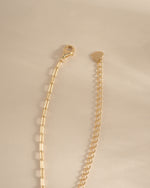 Gold Small Paperclip Necklace from Sami Jewels featuring a lobster clasp closure, stylish and minimalist jewelry accessory.