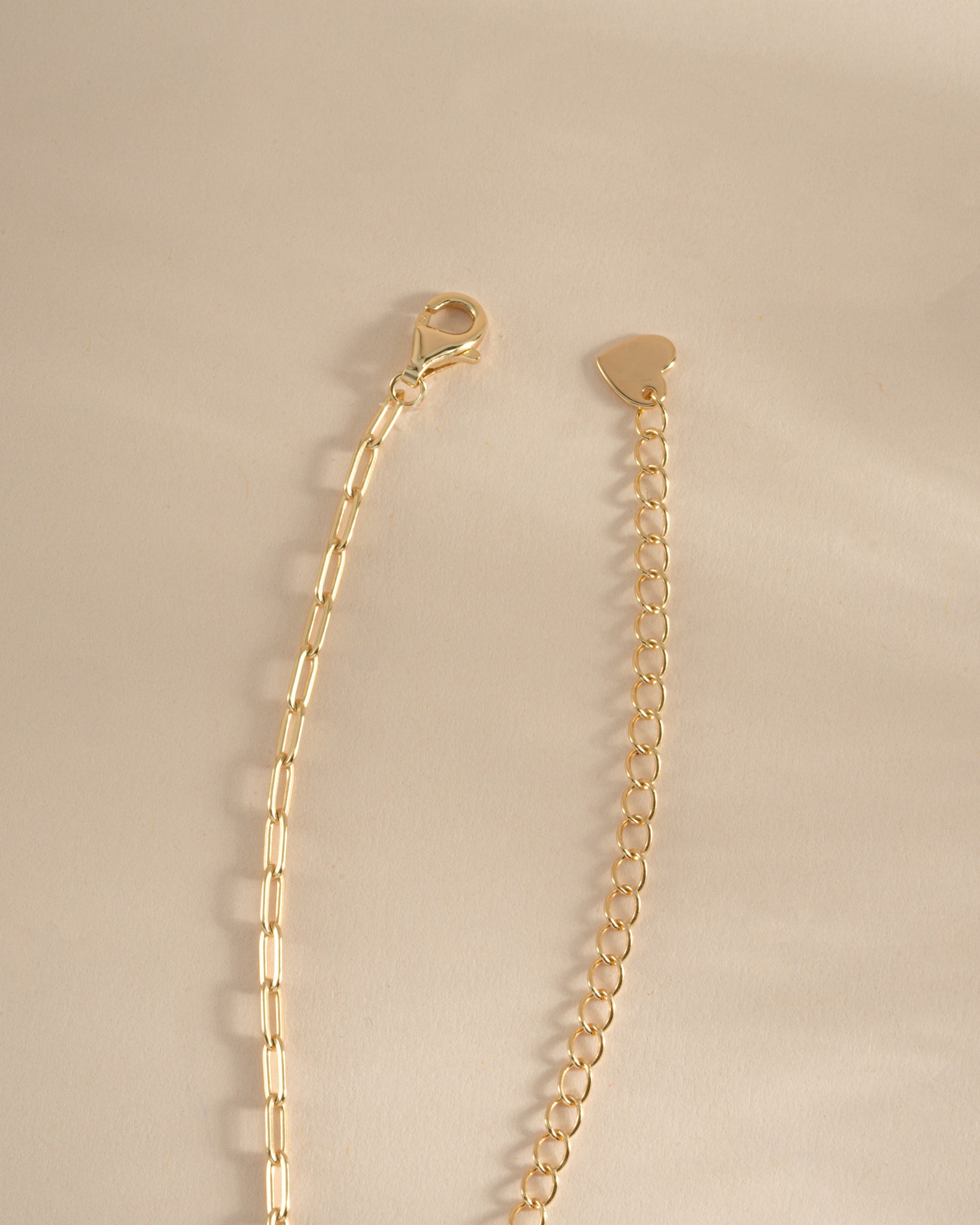 Gold Small Paperclip Necklace from Sami Jewels featuring a lobster clasp closure, stylish and minimalist jewelry accessory.