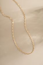 Gold Small Paperclip Necklace by Sami Jewels featuring a sleek, minimalist design on a delicate chain.