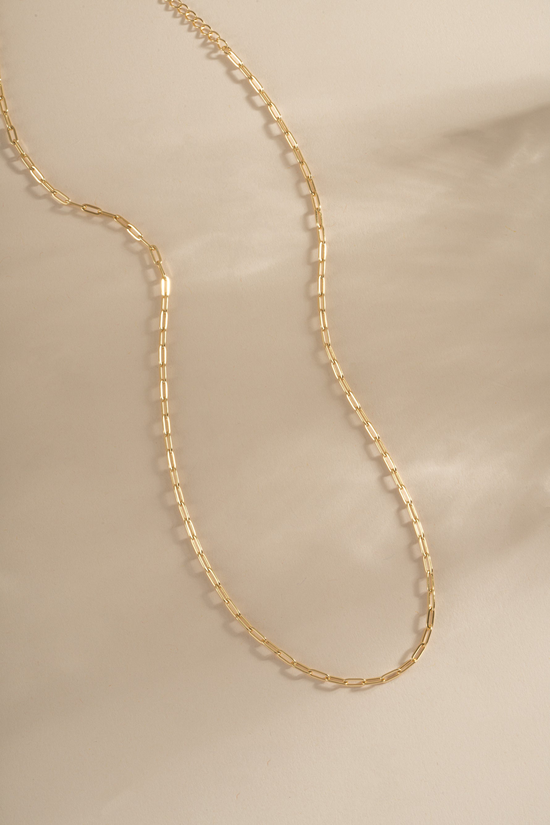 Gold Small Paperclip Necklace by Sami Jewels featuring a sleek, minimalist design on a delicate chain.