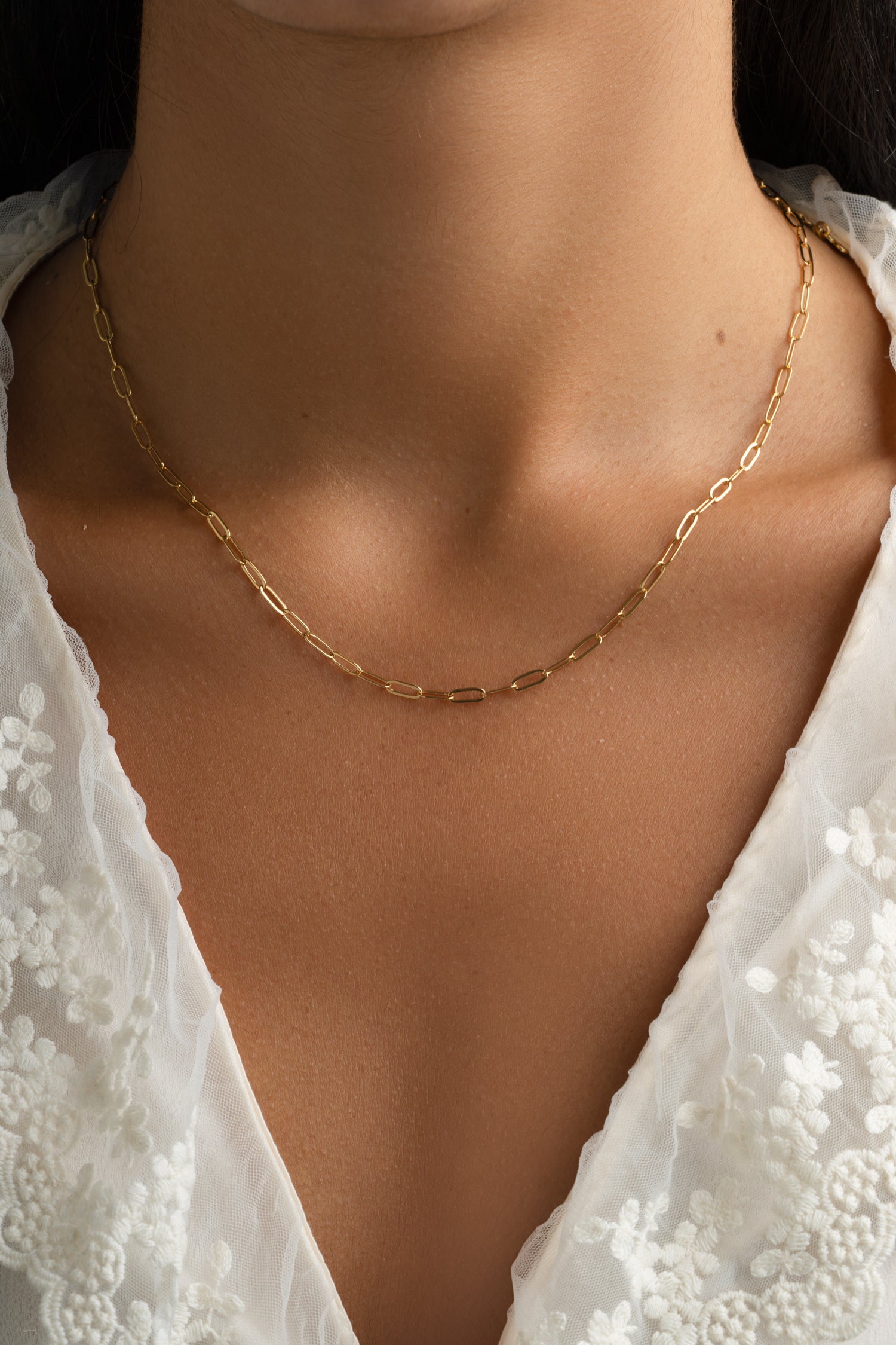 Gold Small Paperclip Necklace from Sami Jewels featuring a sleek, minimalist design in a close-up view.