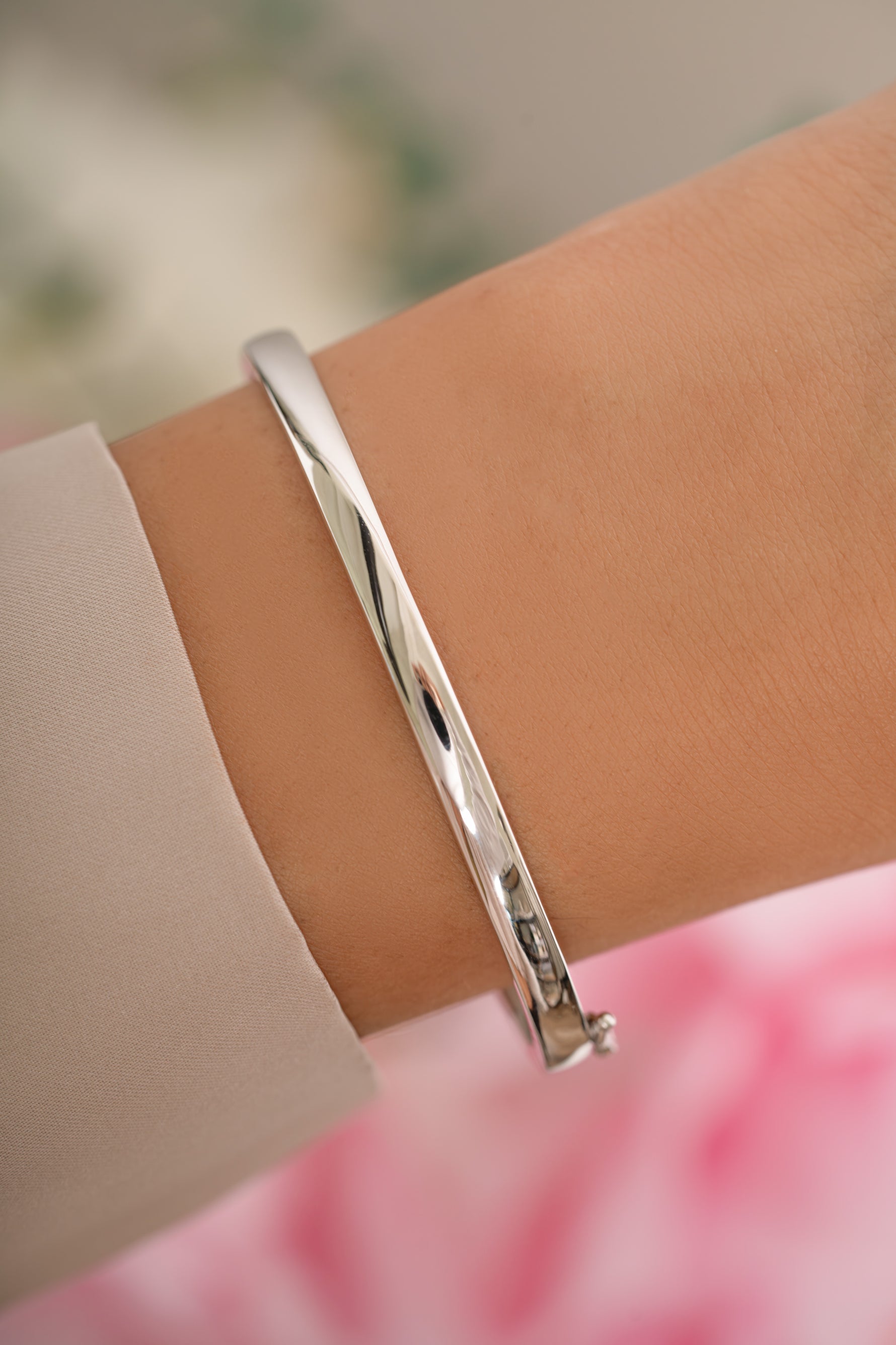 Silver solid bangle bracelet by Sami Jewels featuring a sleek, minimalist design perfect for everyday wear.