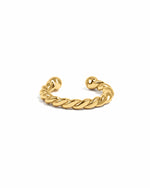 Gold spiral ear cuff earrings by Sami Jewels displayed on a white background, showcasing a sleek, modern jewelry design.