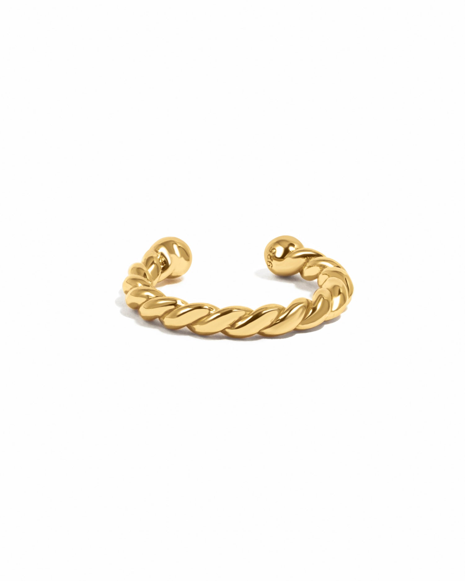 Gold spiral ear cuff earrings by Sami Jewels, shown on a white background, featuring a sleek, modern design for stylish ear adornment.