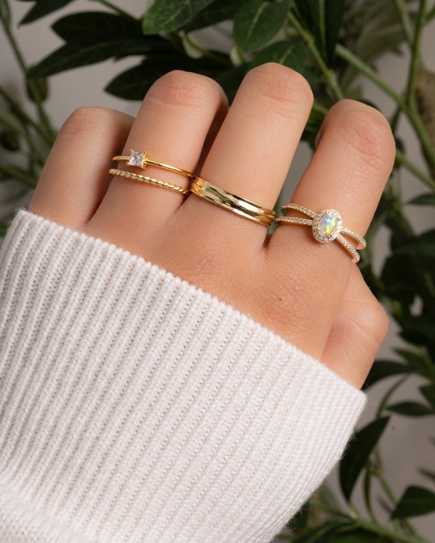 Gold split shank opal ring featuring a vibrant opal gemstone, designed by Samijewels