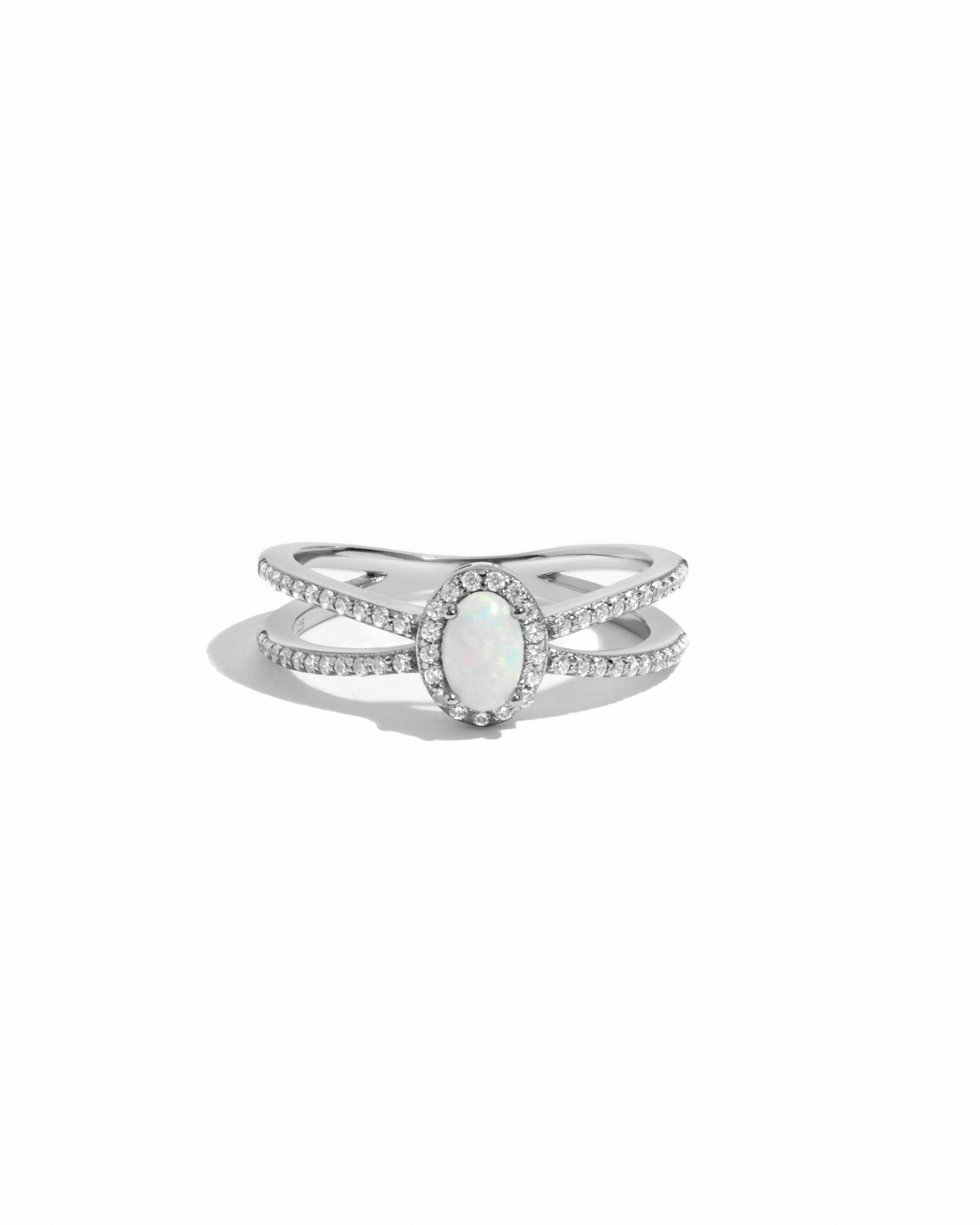 Sterling silver Split Shank Opal Ring with a vibrant white opal centered on a sleek, elegant ring design.