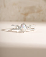 Sterling silver Split Shank Opal Ring featuring a vibrant opal gemstone and a stylish split band design.