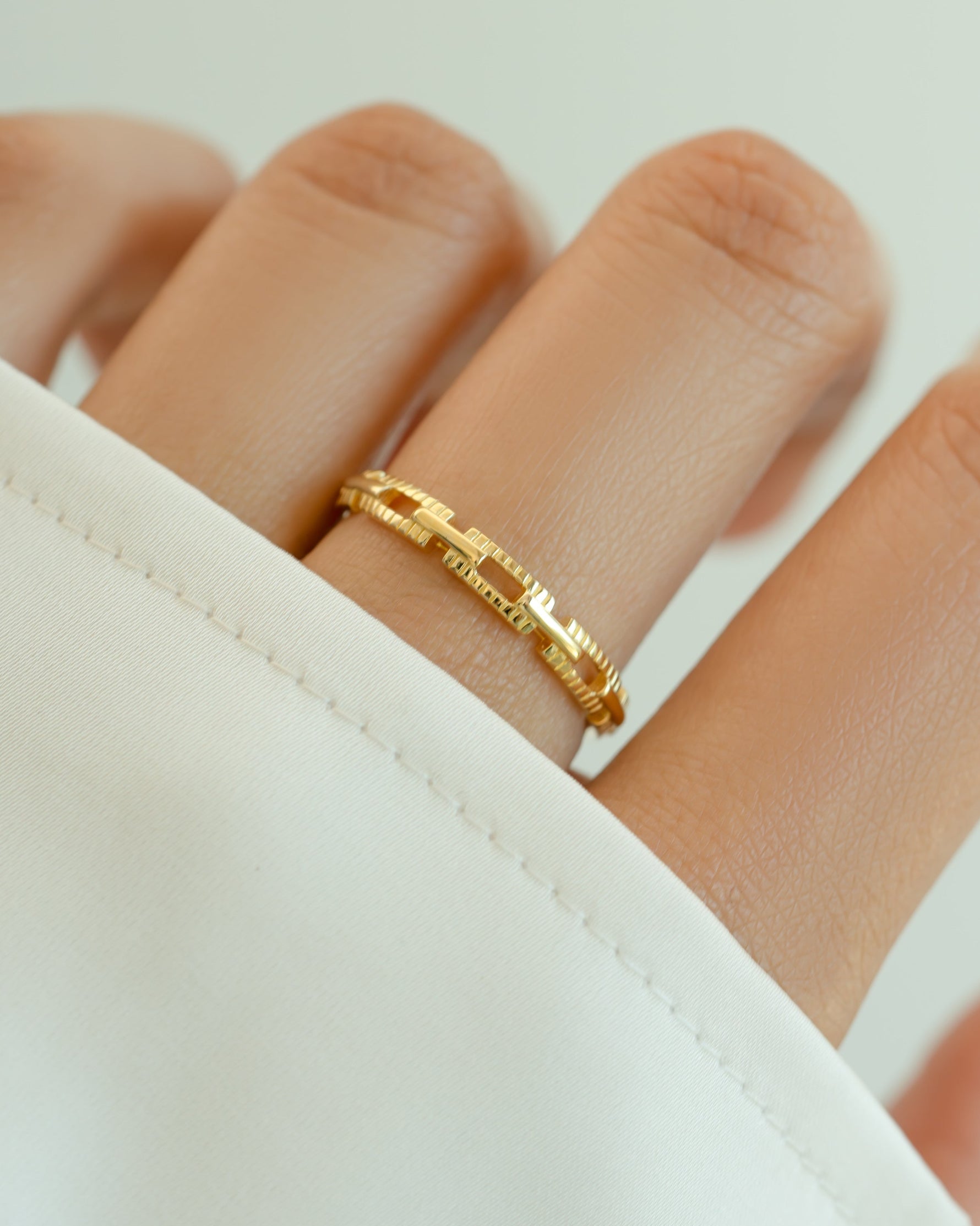 Gold Square Link Ring by Sami Jewels featuring a modern geometric design and sleek square-shaped links.