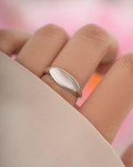 Sterling silver square signet ring by Sami Jewels featuring a sleek, polished design and a bold, geometric shape.