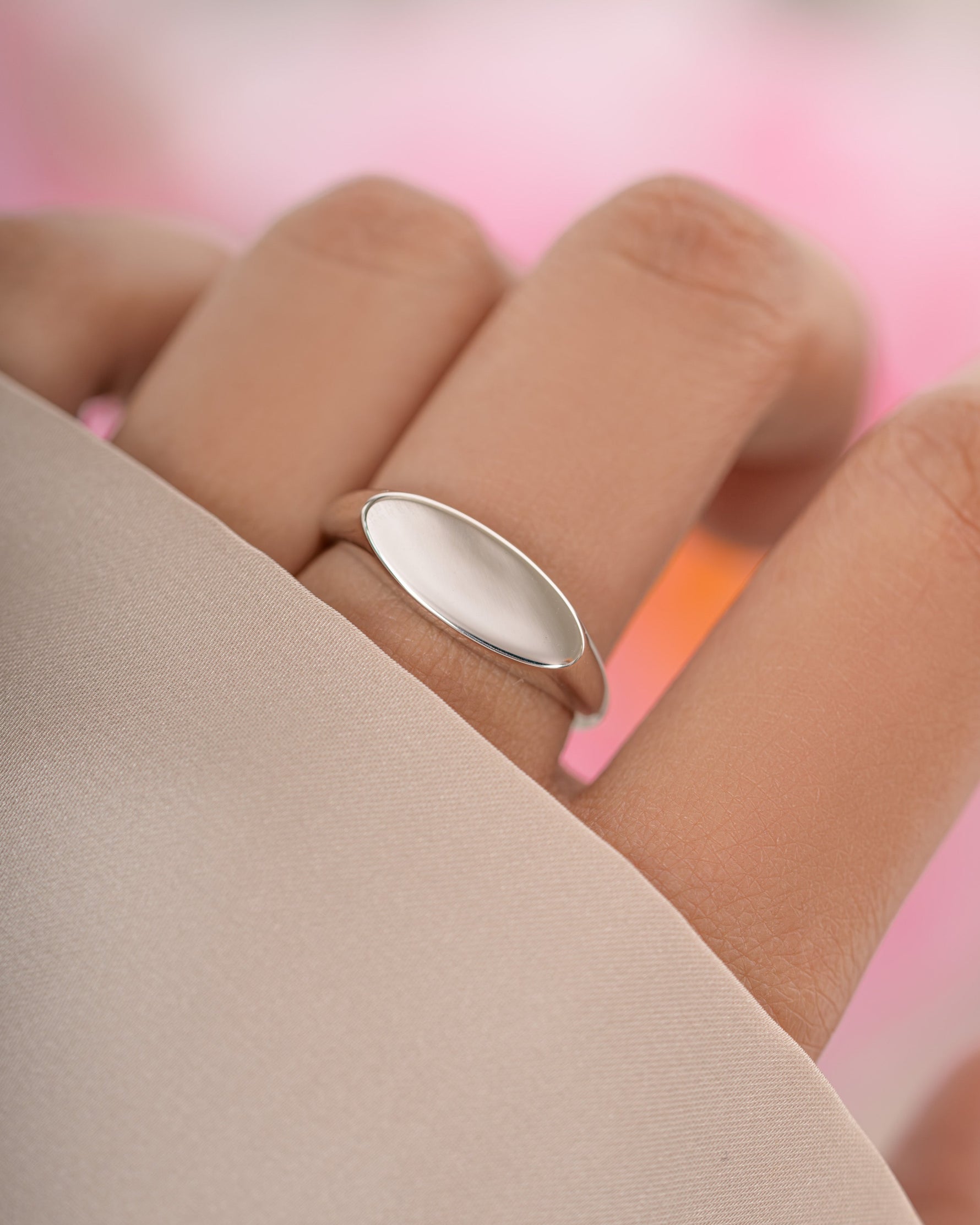 Sterling silver square signet ring by Sami Jewels featuring a sleek, polished design and a bold, geometric shape.