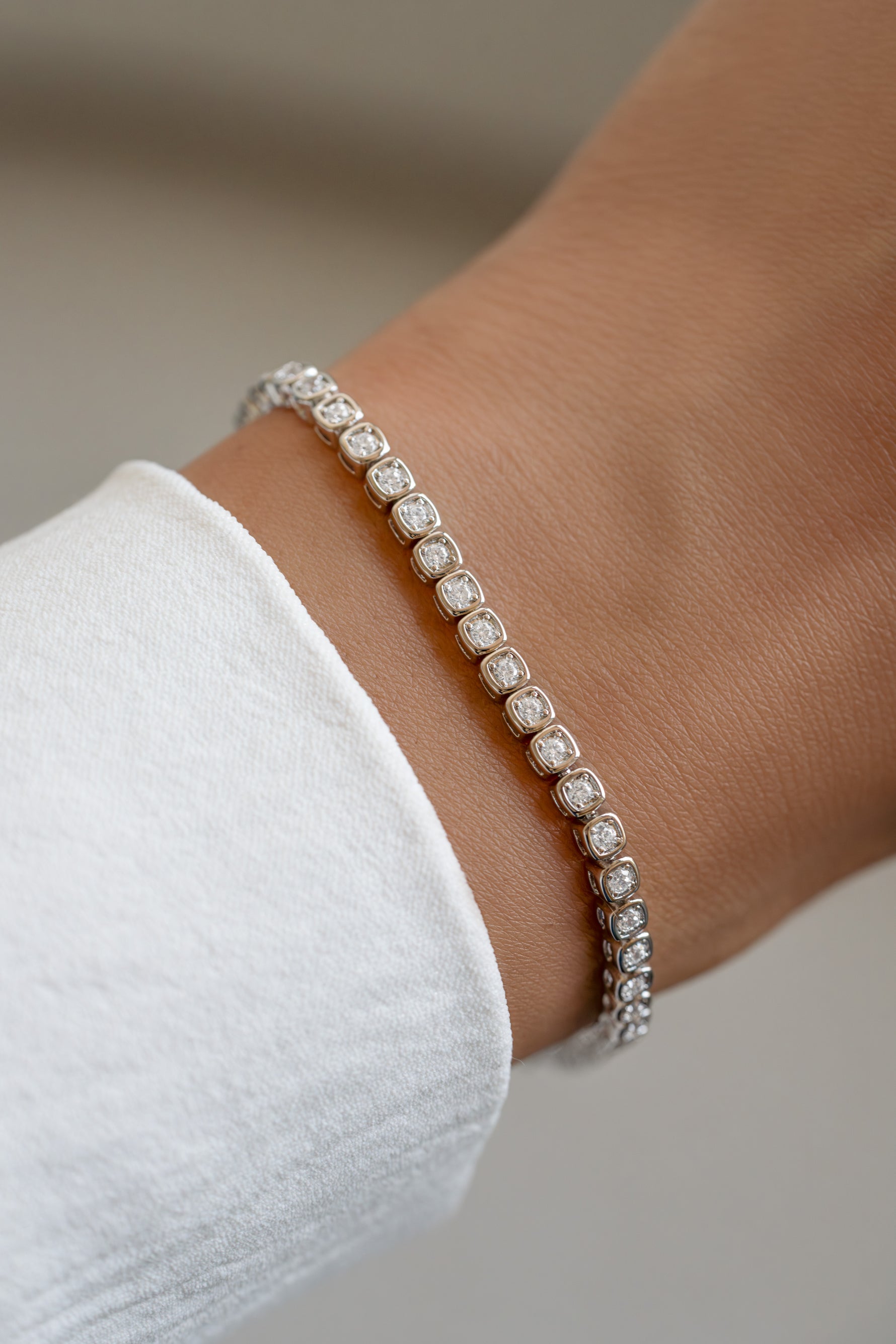 Silver Chloe Tennis Bracelet by Sami Jewels featuring classic square-shaped links and elegant design.