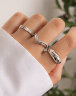 Sami Jewels sterling silver star dome ring worn on a model's hand, featuring a unique dome design with star motifs.