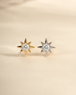 Sami Jewels starburst earrings featuring sterling silver and gold with a radiant, sunburst design.