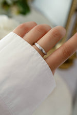 Sterling silver Starburst Ring by Sami Jewels featuring a radiant, geometric starburst design on a smooth band.