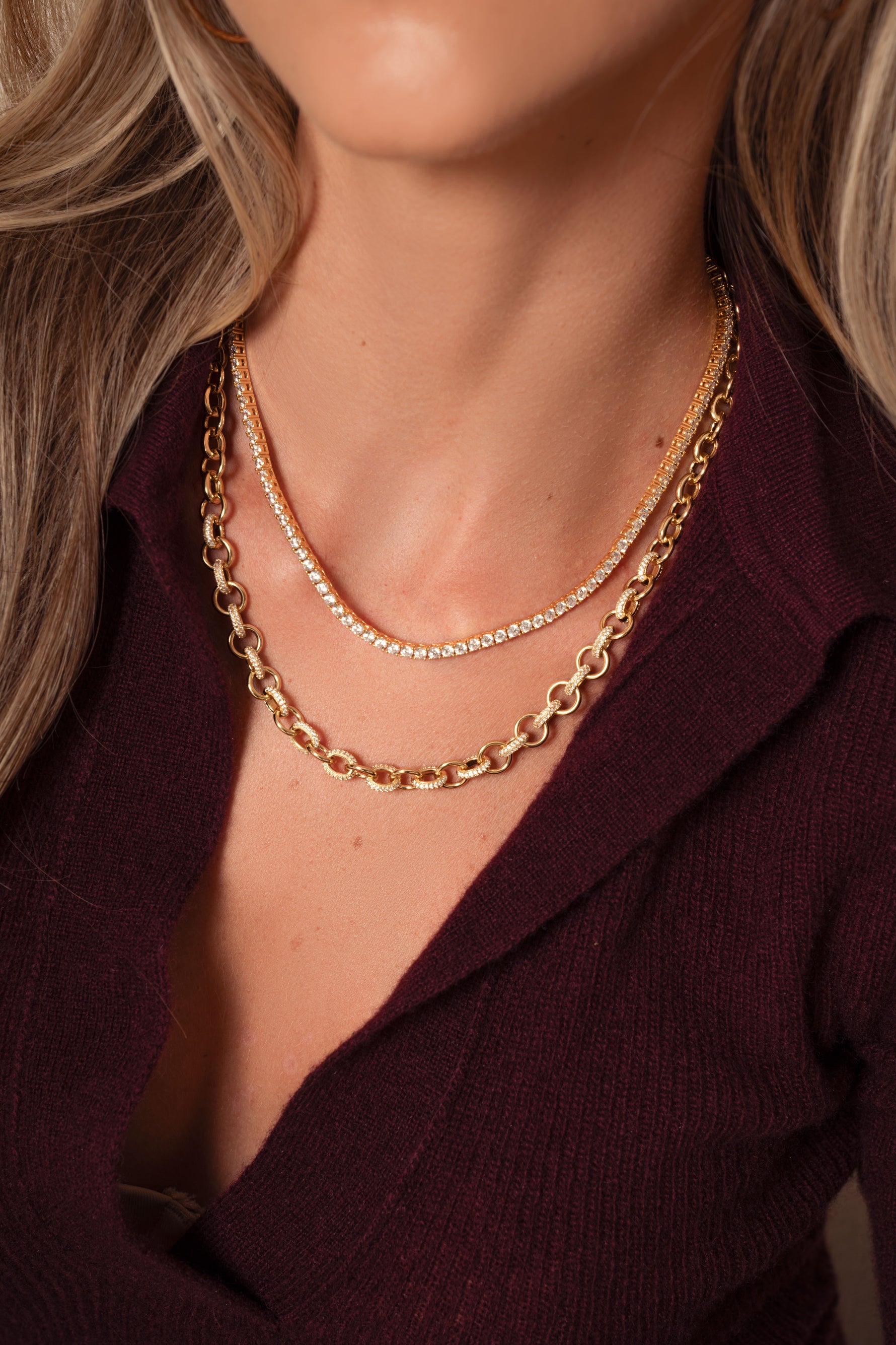 Gold Sami Jewels Statement Pavé Necklace worn by a model, featuring sparkling pavé stones and bold design.