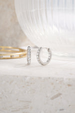 sterling silver 10mm in and out studded huggie hoops side view