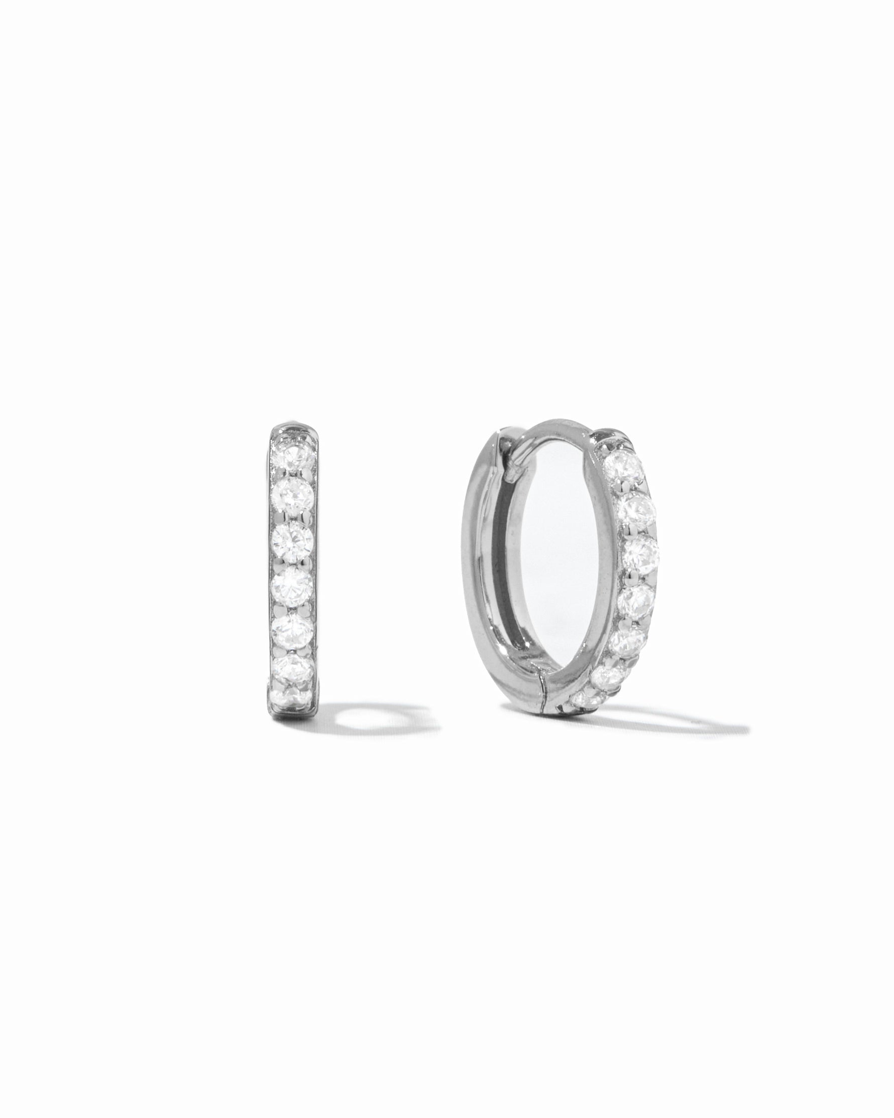sterling silver 10mm diamond huggie hoop earring white background