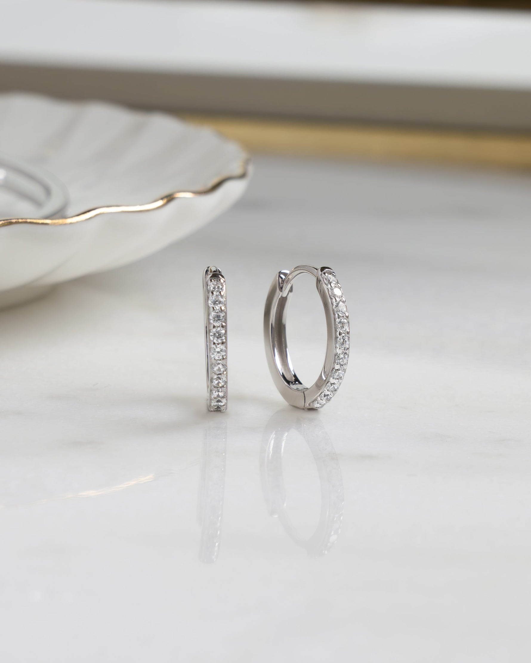 sterling silver 13mm studded huggie hoop plain background