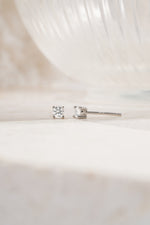sterling silver 3mm diamond solitaire stud earrings side view white backhground