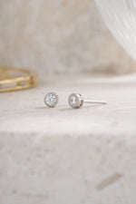 sterling silver 4mm diamond stud earring closeup