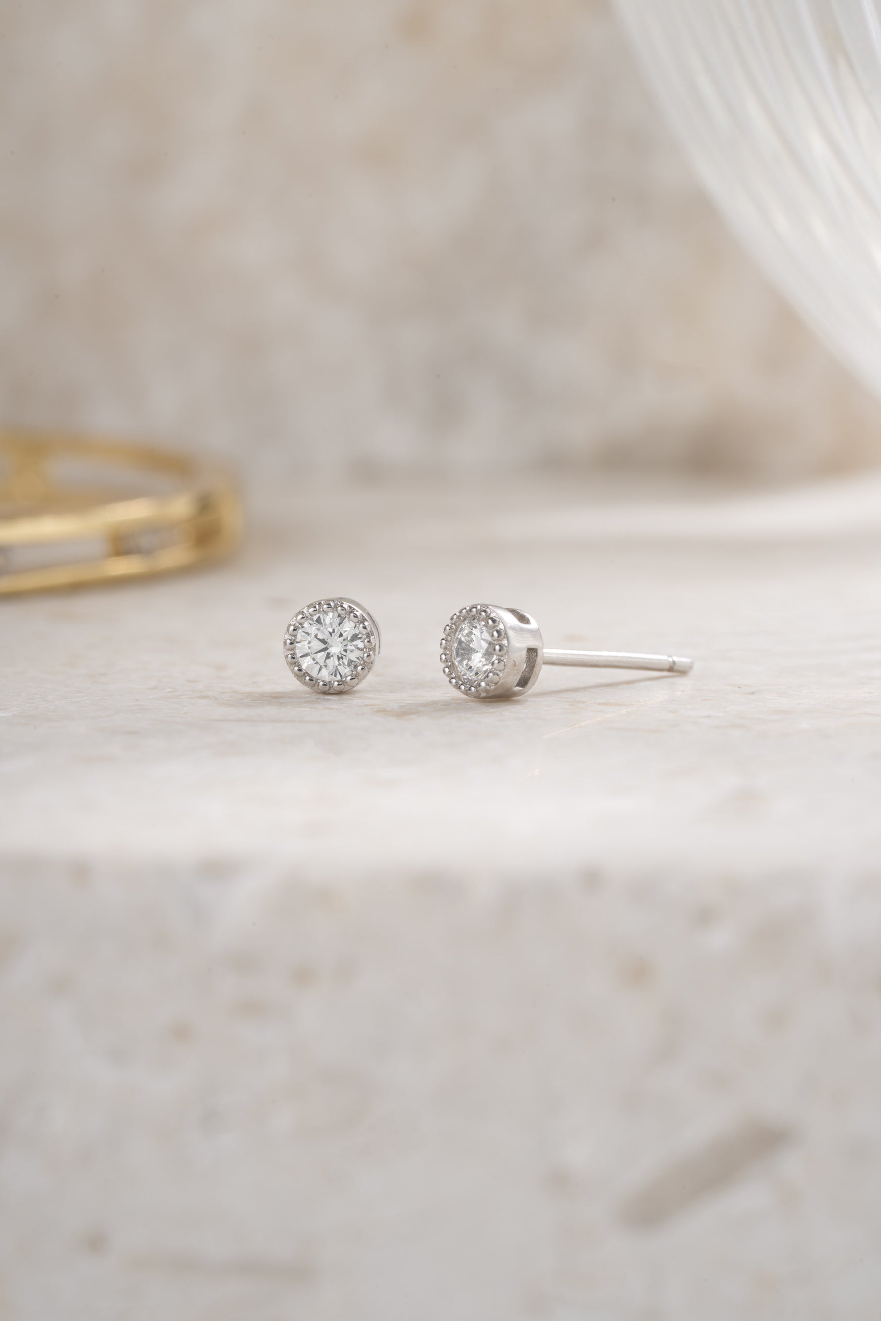 sterling silver 4mm diamond stud earring closeup