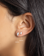 sterling silver 4x8mm marquise cut stud earrings and 3x6mm marquise cut stud earrings on womens ear