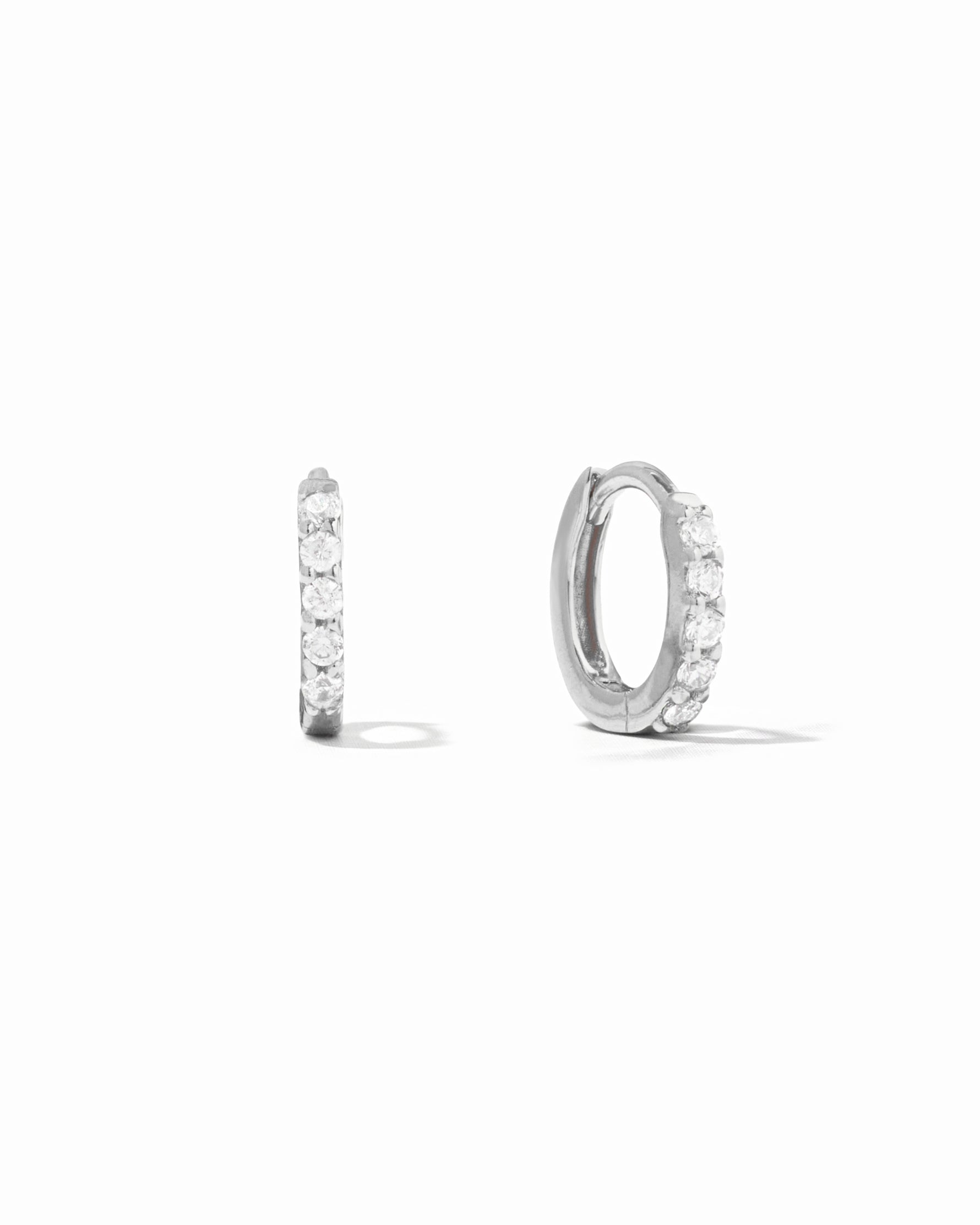 sterling silver 7mm diamond huggie hoop earring white background