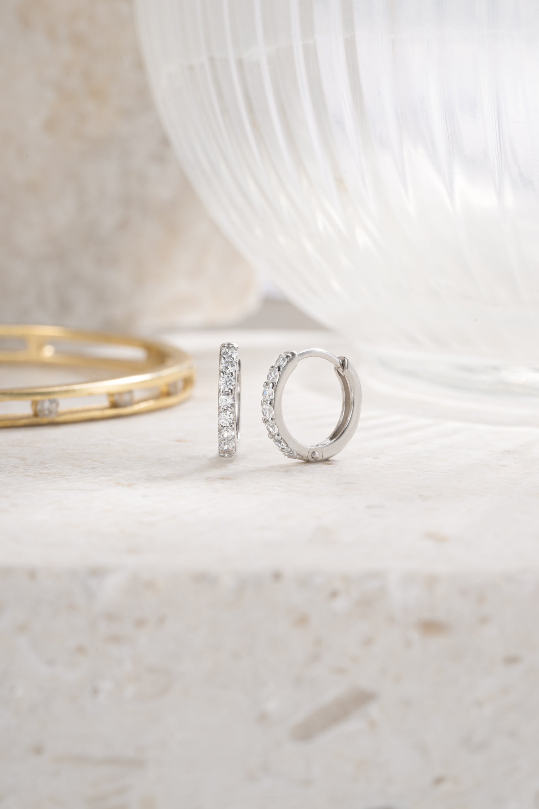 sterling silver 8mm diamond studded huggie hoop angled