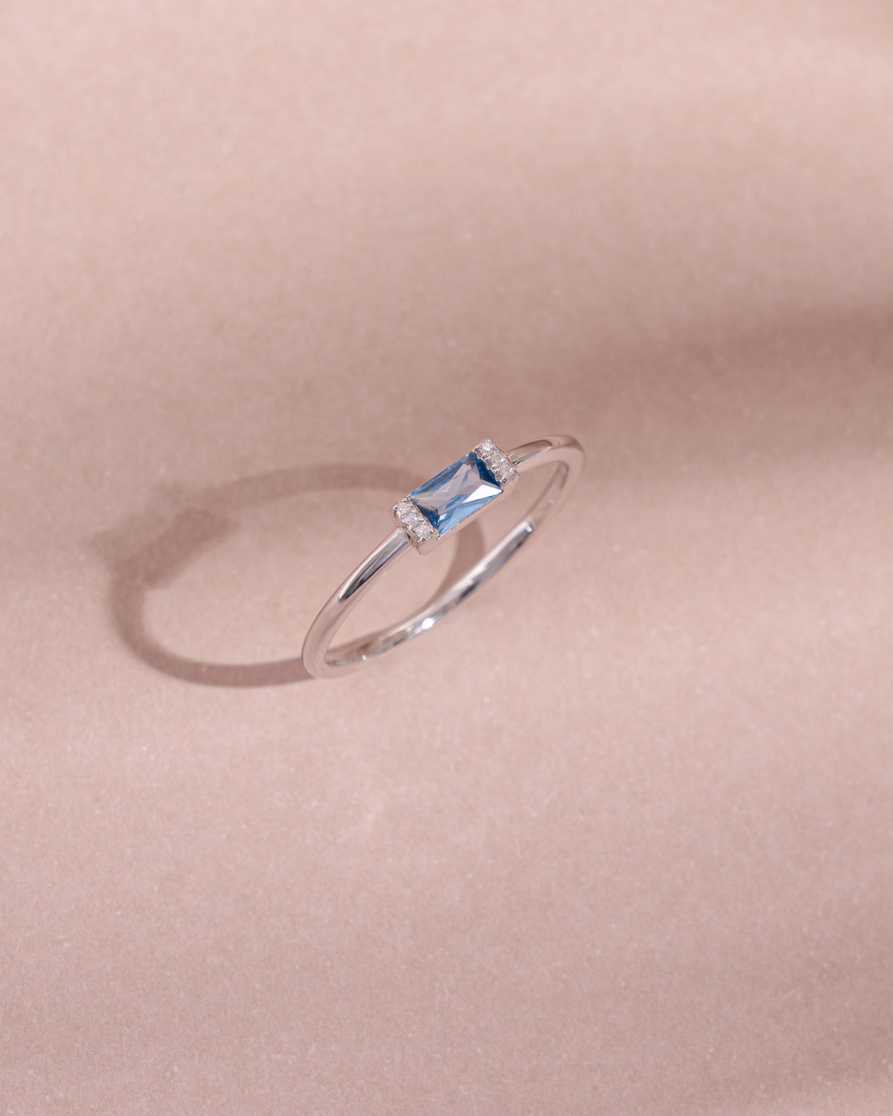 sterling silver aquamarine diamond baguette birthstone ring close up