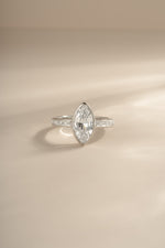 Sterling silver Bezel Marquise Ring with Baguette Band by Sami Jewels, featuring a marquise-shaped gemstone and sleek band design.