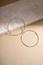 sterling silver classic hoop earrings 60mm size neutral background