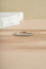 sterling silver diamond eternity ring neutral background