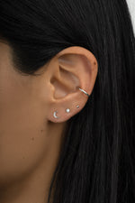 Sterling silver plain ear cuff on model