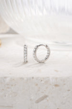 sterling silver 9mm studded huggie earrings angled view