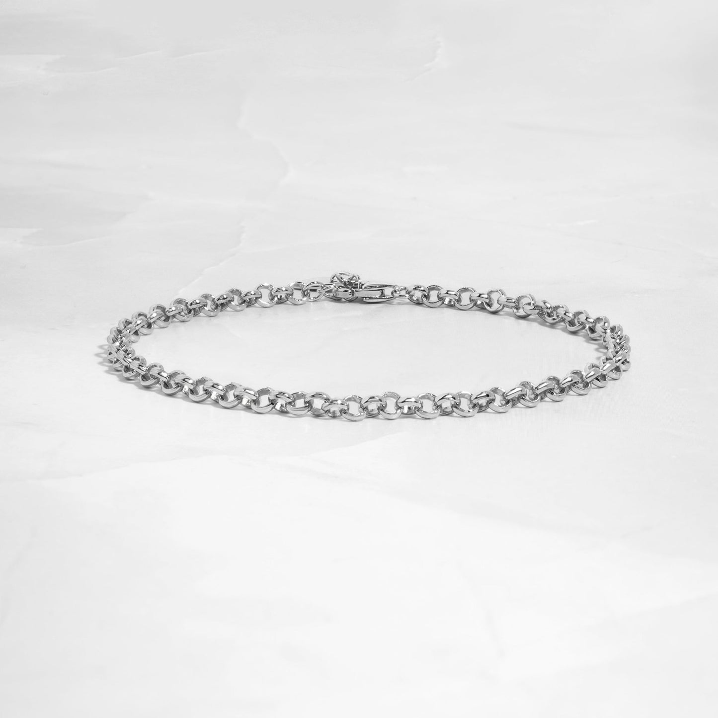 Simple Rolo Chain Bracelet in Sterling Silver on white background