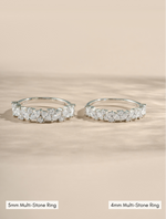 5mm sterling silver multistone ring compared to a 4mm sterling silver multi stone ring on a neutral background