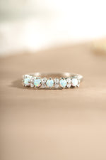 sterling silver opal and cubic zirconia stacking ring neutral background