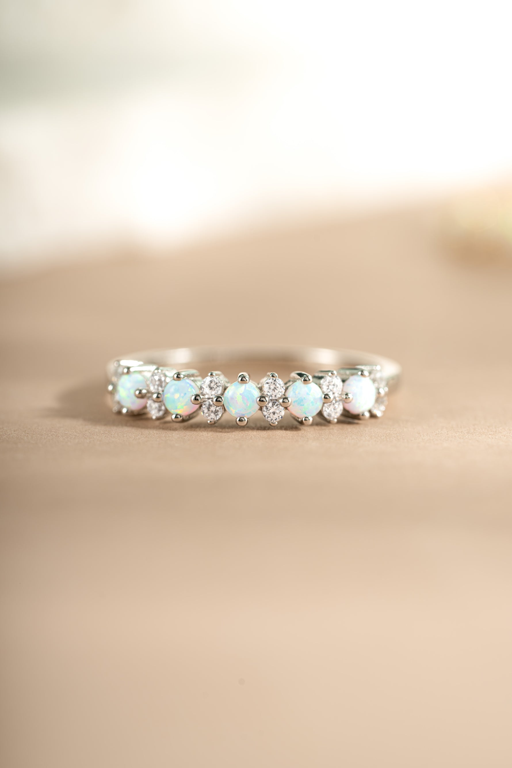 sterling silver opal and cubic zirconia stacking ring neutral background