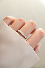 sterling silver opal and cubic zirconia stacking ring on womens hand