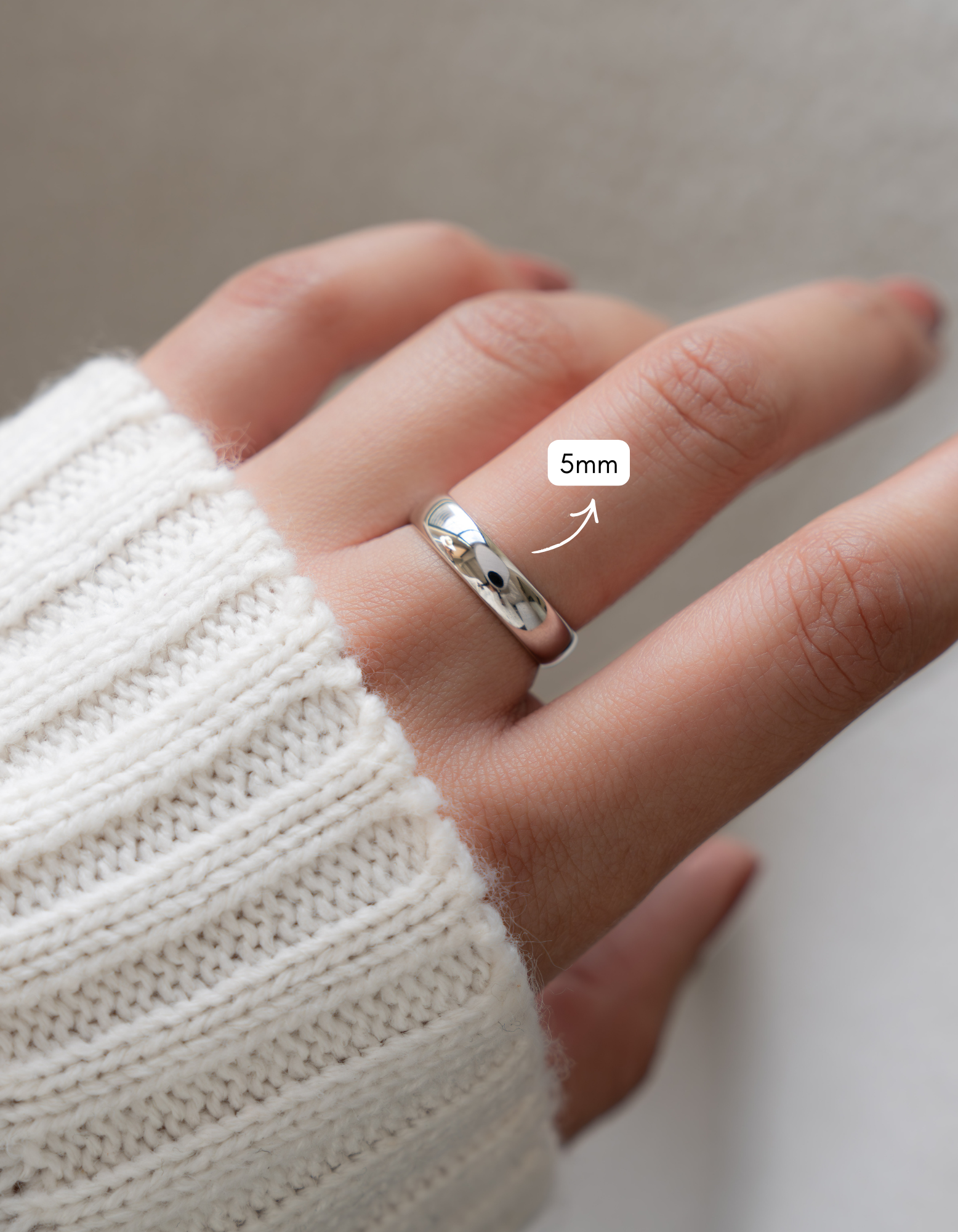Sterling silver 5mm plain band ring by Sami Jewels, showcasing a smooth, polished surface and classic design.