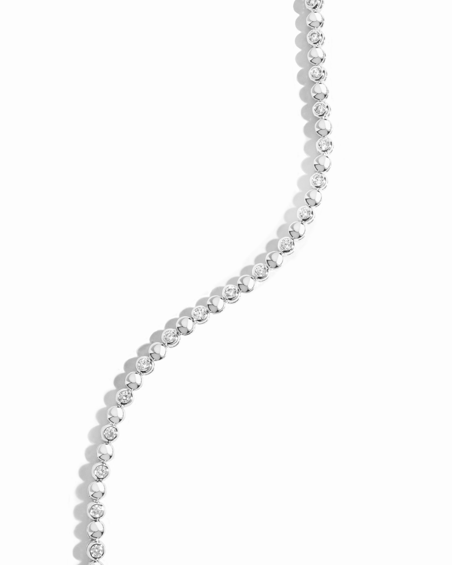 Sterling silver moissanite bezel bracelet on white background