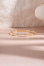 Gold studded diamond bangle bracelet by Sami Jewels, front view showcasing sparkling embellishments and sleek design.