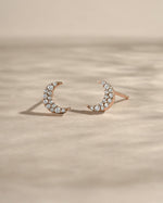 Rose gold studded moon earrings by Sami Jewels featuring small star accents and a sleek, minimalist design.